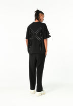 Camiseta Relaxed Fit con manga caída y X de cordones cruzados | MWM [PS_COLORS:BLACK]
