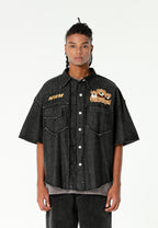 Camisa vaquera TEDDY de corte relajado con parches Teddy en frontal y espalda | MWM [PS_COLORS:BLACK]