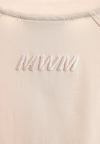 Camiseta oversize con bolsillos frontales técnicos y logo bordado en la espalda | MWM [PS_COLORS:ECRU]