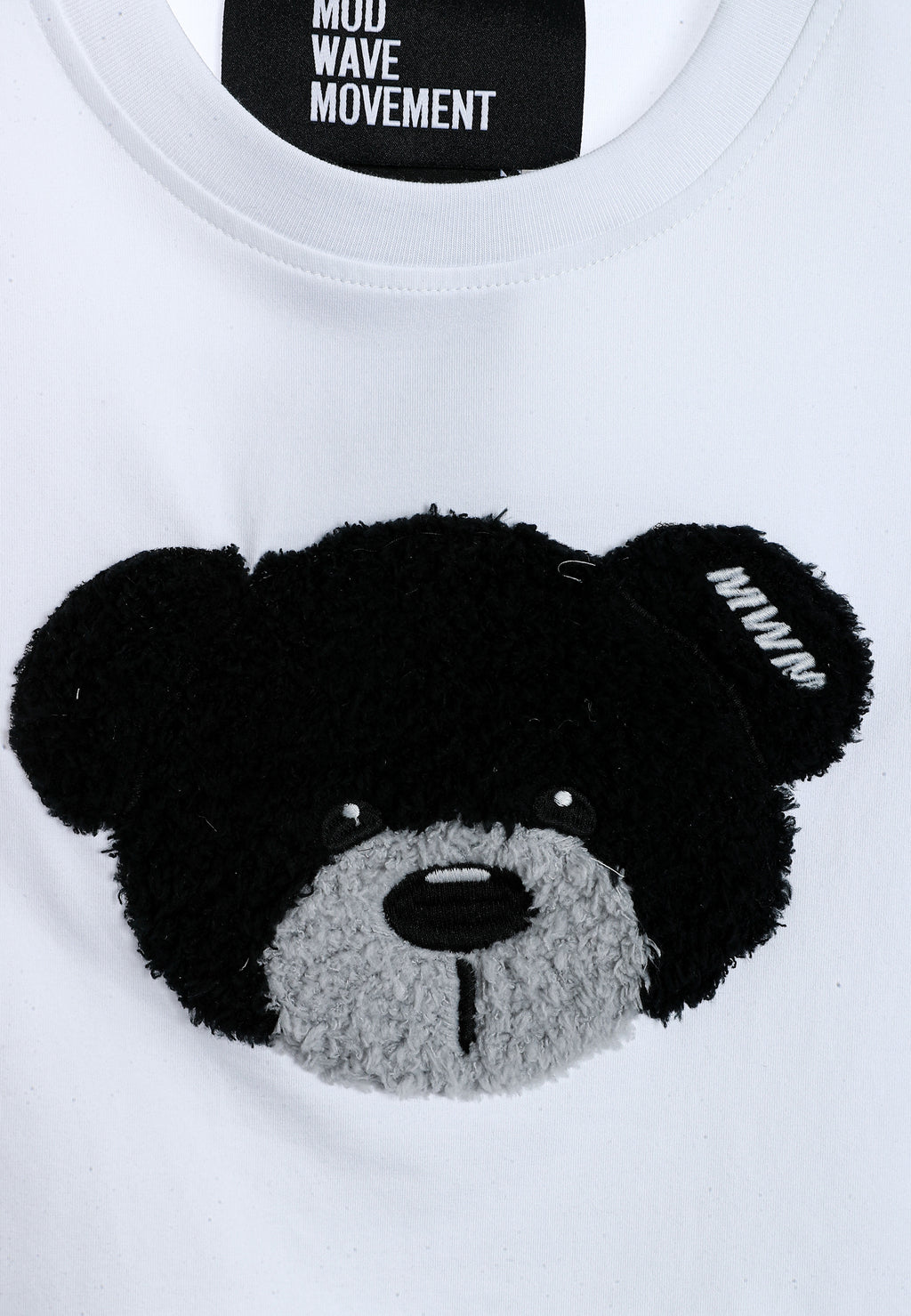 Camiseta de mujer TEDDY Mike Bag corta con gran parche frontal y detalles en mangas | MWM [PS_COLORS:WHITE]