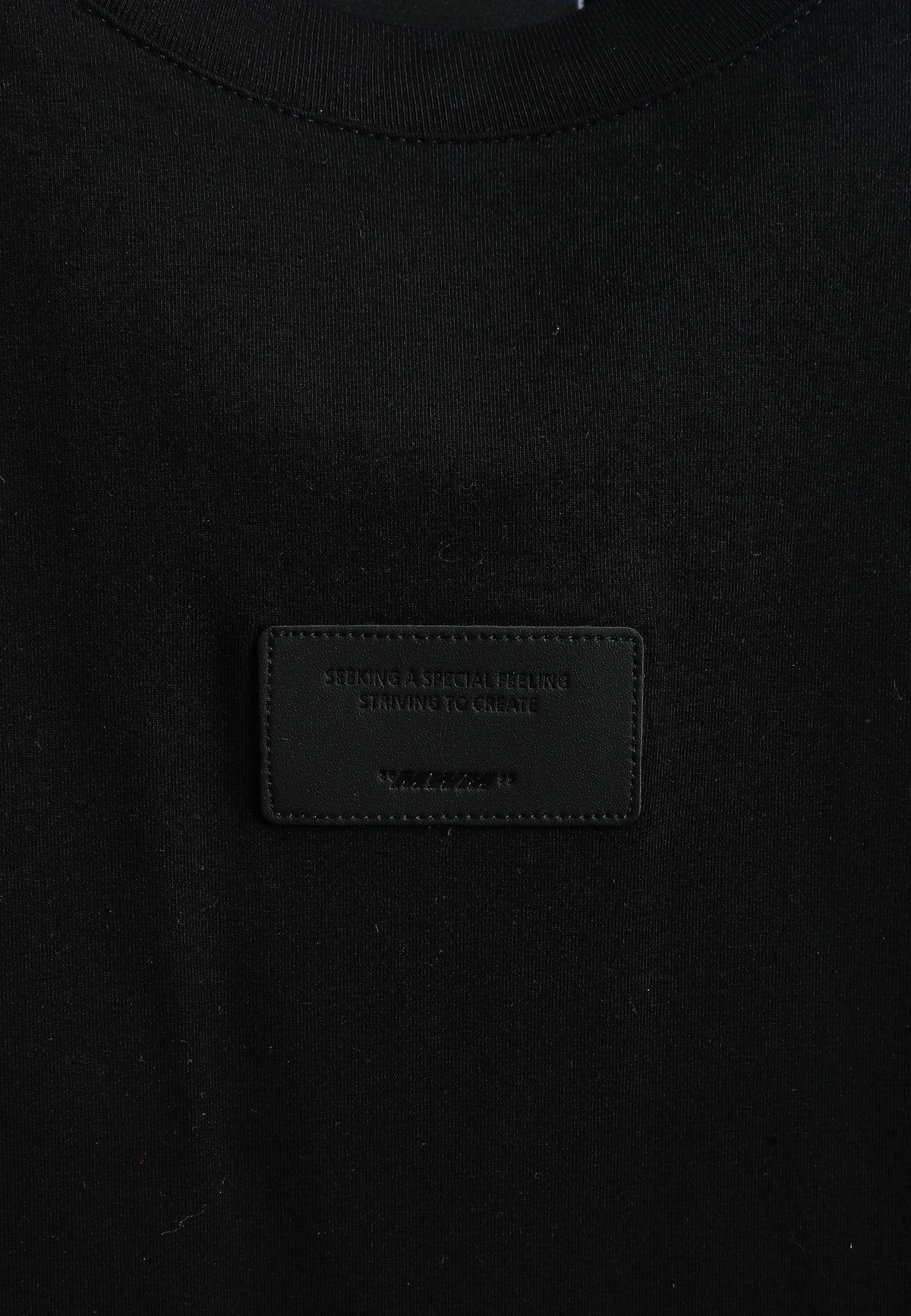 Camiseta Wings de corte relajado con parches Mini Wings en las mangas | MWM [PS_COLORS:BLACK]