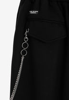 Pantalón Básico con pinzas, bajos ajustables y cadena lateral | MWM [PS_COLORS:BLACK]