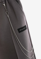 Pantalón Básico con pinzas, bajos ajustables y cadena lateral | MWM [PS_COLORS:GREY]