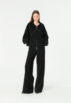 Pantalón palazzo de mujer de pierna ancha con efecto faja y tachuelas laterales | MWM [PS_COLORS:BLACK]