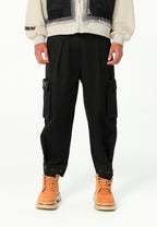 Pantalón cargo de corte relajado con doble cintura y bolsillos laterales | MWM [PS_COLORS:BLACK]