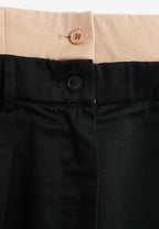 Pantalón cargo de corte relajado con doble cintura y bolsillos laterales | MWM [PS_COLORS:BLACK]