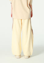 Pantalón barrel con cintas asimétricas MWM y bajos ajustables | MWM [PS_COLORS:BEIGE]