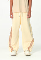 Pantalón barrel con cintas asimétricas MWM y bajos ajustables | MWM [PS_COLORS:BEIGE]