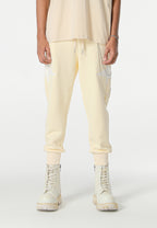 Pantalón jogger Wings con parches de estrellas y cadena lateral | MWM [PS_COLORS:BEIGE]