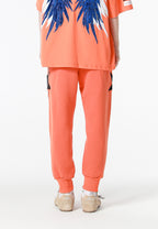 Pantalón jogger Wings con parches de estrellas y cadena lateral | MWM [PS_COLORS:ORANGE]