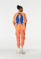 Pantalón jogger Wings con parches de estrellas y cadena lateral | MWM [PS_COLORS:ORANGE]