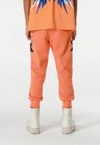 Pantalón jogger Wings con parches de estrellas y cadena lateral | MWM [PS_COLORS:ORANGE]