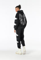Pantalón jogger Wings con parches Mini Wings en los laterales | MWM [PS_COLORS:BLACK]