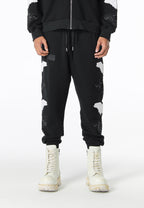 Pantalón jogger Wings con parches Mini Wings en los laterales | MWM [PS_COLORS:BLACK]