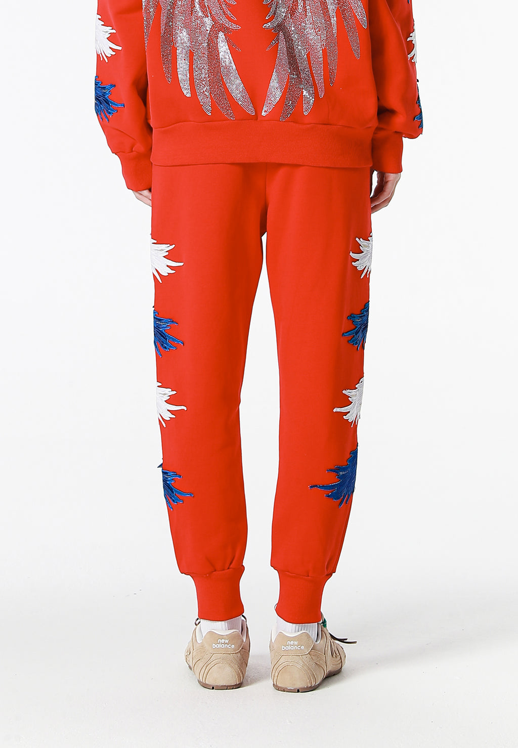 Pantalón jogger Wings con parches Mini Wings en los laterales | MWM [PS_COLORS:RED]