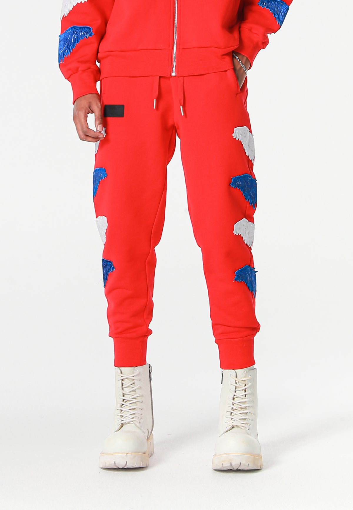 Pantalón jogger Wings con parches Mini Wings en los laterales | MWM [PS_COLORS:RED]