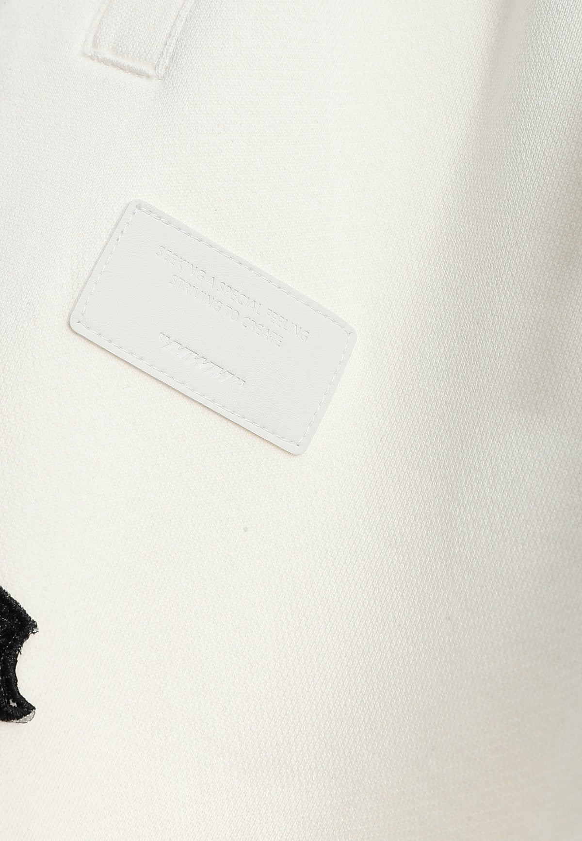 Pantalón jogger Wings con parches Mini Wings en los laterales | MWM [PS_COLORS:WHITE]
