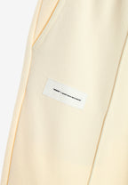 Pantalón TEDDY de corte recto y relajado con bordado Mod Wave Movement en la parte trasera | MWM [PS_COLORS:ECRU]