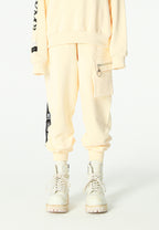 Pantalón jogger Vanguard Dogs con bolsillo cargo lateral y bordado trasero | MWM [PS_COLORS:ECRU]