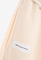 Pantalón jogger Vanguard Dogs con bolsillo cargo lateral y bordado trasero | MWM [PS_COLORS:ECRU]