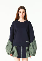Sudadera corta y relajada con cuello en pico y mangas globo | MWM [PS_COLORS:NAVY]