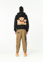 Sudadera con capucha TEDDY corta con parche Teddy de peluche en la espalda | MWM [PS_COLORS:BLACK]