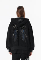 Sudadera con capucha Wings de corte relajado con estrellas frontales y alas en la espalda | MWM [PS_COLORS:BLACK]