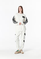 Sudadera Wings de corte relajado con alas de tachuelas en hombros y mangas | MWM [PS_COLORS:WHITE]