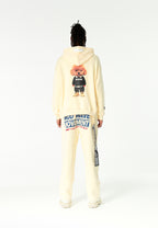 Sudadera con capucha TEDDY de corte regular con bordado frontal y print Streetwear Dog en la espalda | MWM [PS_COLORS:ECRU]