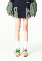 Falda efecto globo con paneles técnicos y bolsillos laterales | MWM [PS_COLORS:NAVY/GREEN]