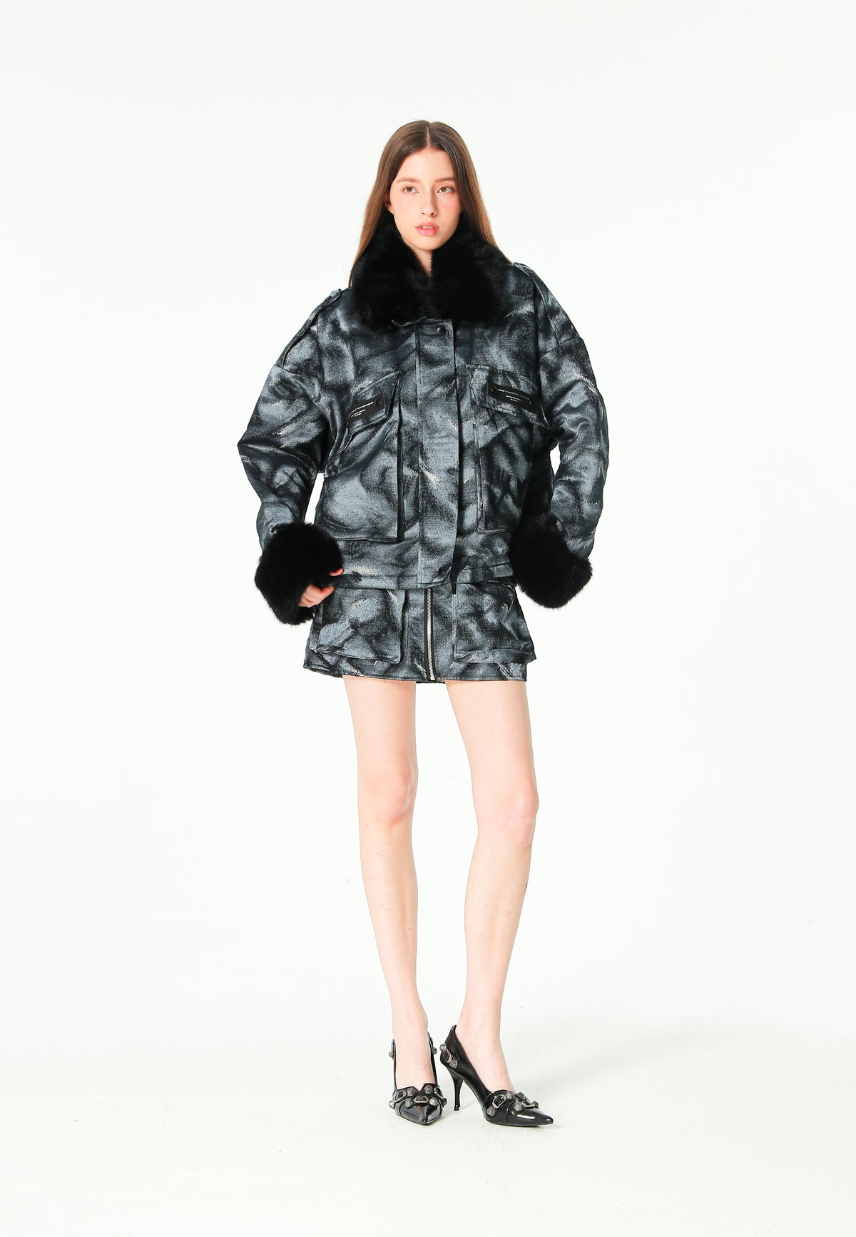 Minifalda jacquard de chenilla con brillo, cremallera y bolsillos frontales | MWM [PS_COLORS:BLACK]