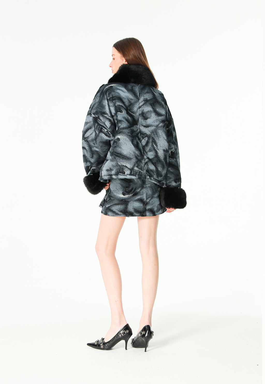 Minifalda jacquard de chenilla con brillo, cremallera y bolsillos frontales | MWM [PS_COLORS:BLACK]