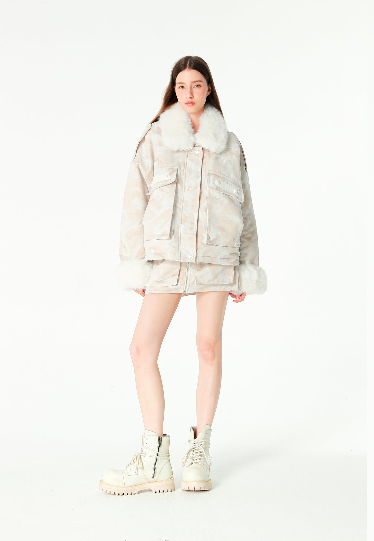 Minifalda jacquard de chenilla con brillo, cremallera y bolsillos frontales | MWM [PS_COLORS:IVORY]