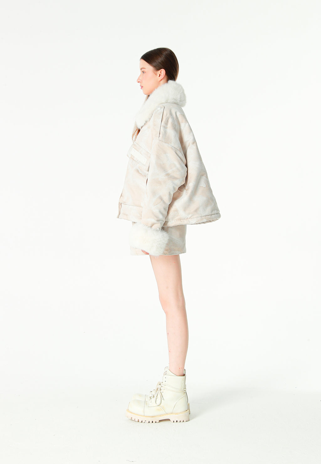 Minifalda jacquard de chenilla con brillo, cremallera y bolsillos frontales | MWM [PS_COLORS:IVORY]