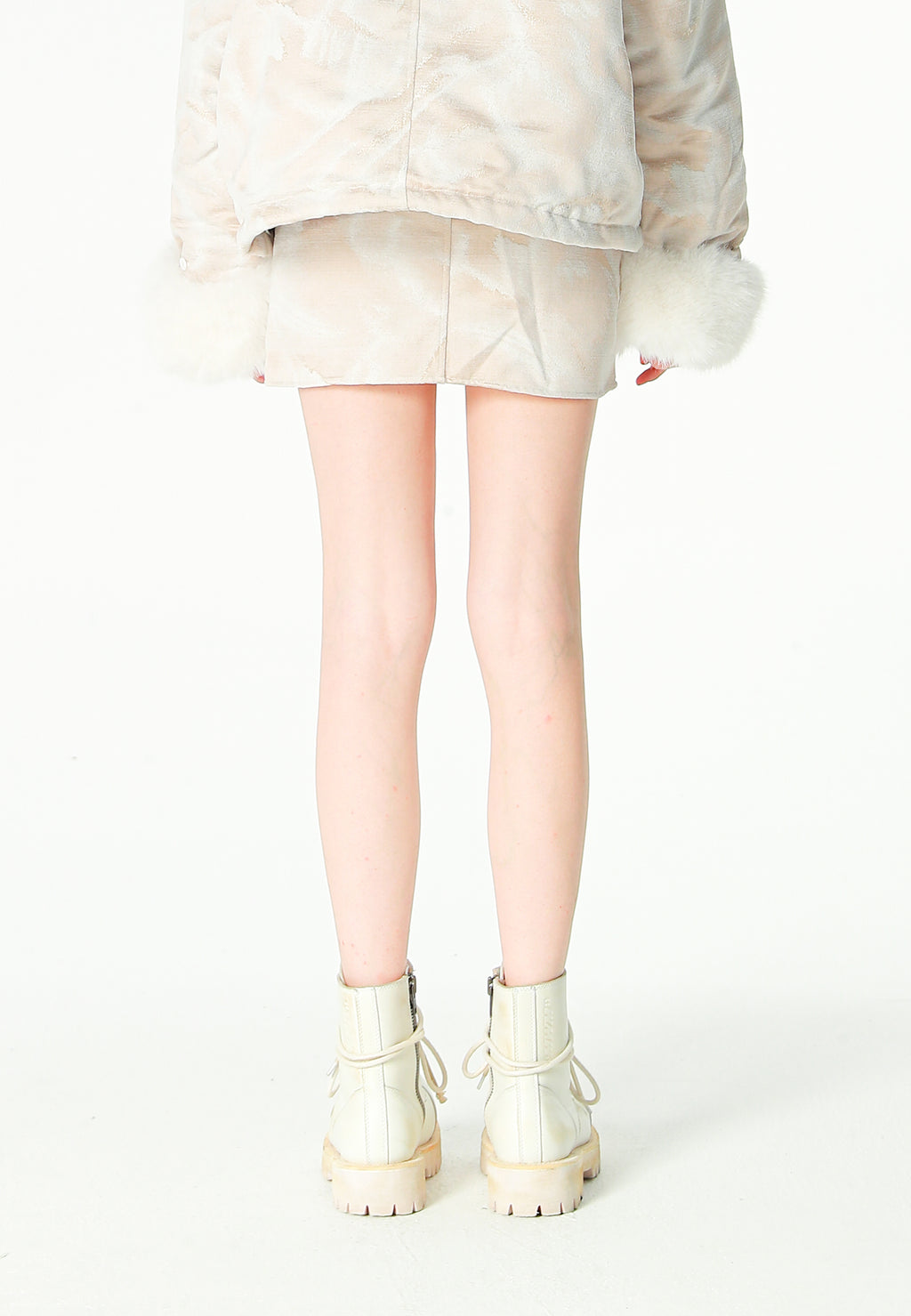 Minifalda jacquard de chenilla con brillo, cremallera y bolsillos frontales | MWM [PS_COLORS:IVORY]