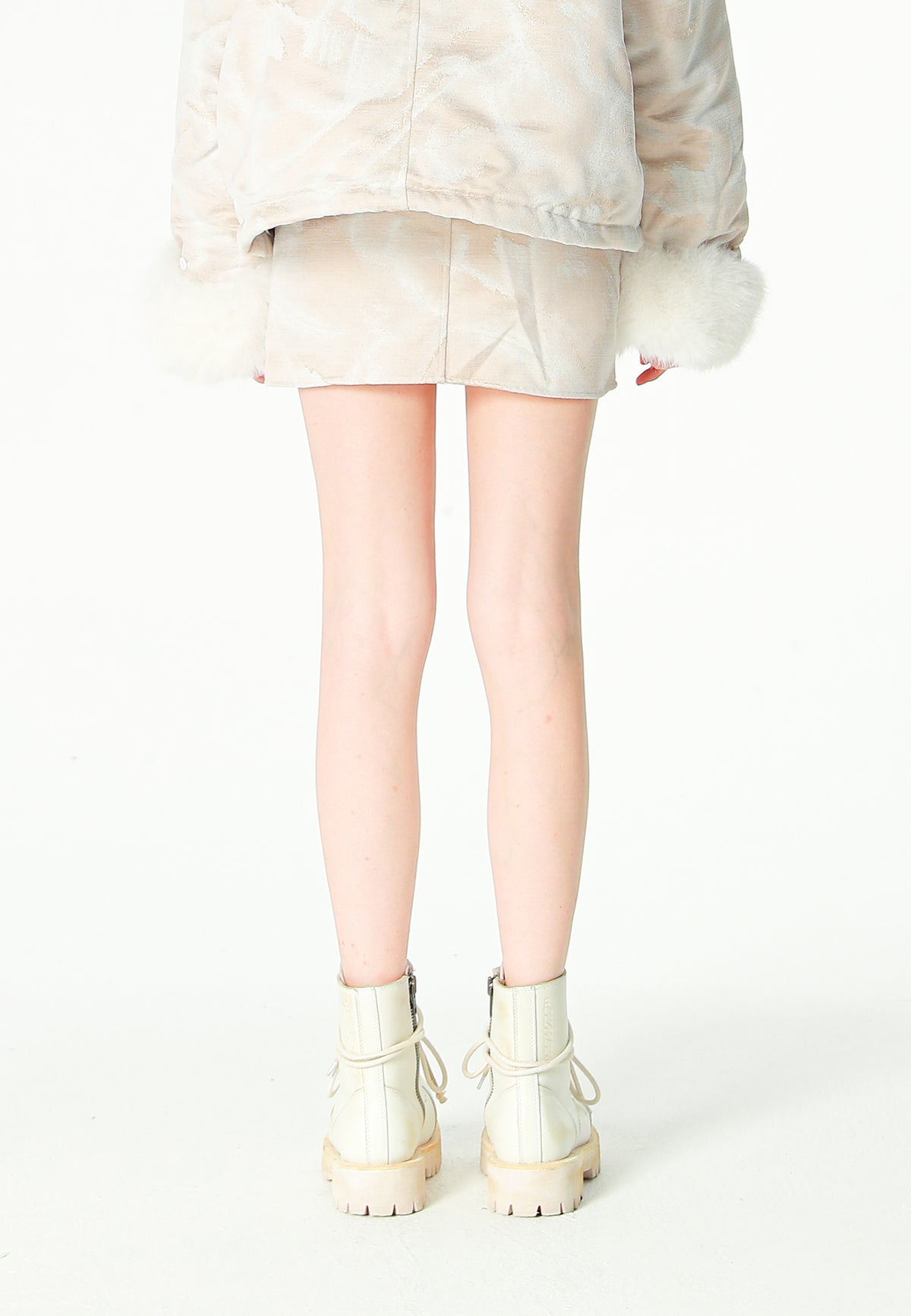 Minifalda jacquard de chenilla con brillo, cremallera y bolsillos frontales | MWM [PS_COLORS:IVORY]