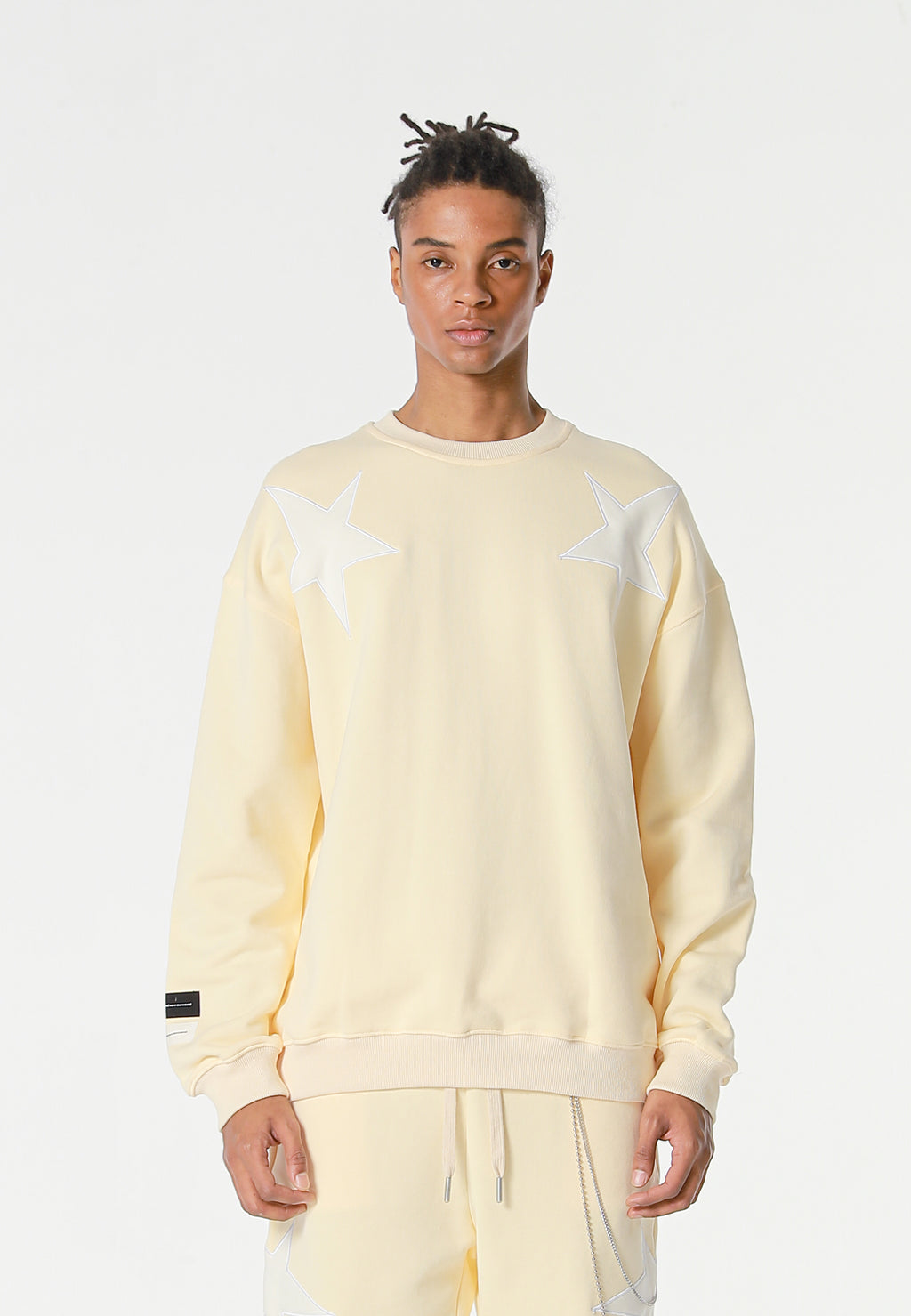 Sudadera Wings de corte relajado con estrellas frontales y doble parche de alas en la espalda | MWM [PS_COLORS:BEIGE]