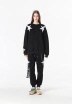 Sudadera Wings de corte relajado con estrellas frontales y doble parche de alas en la espalda | MWM [PS_COLORS:BLACK]