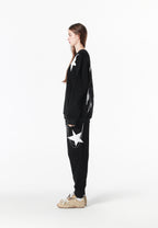 Sudadera Wings de corte relajado con estrellas frontales y doble parche de alas en la espalda | MWM [PS_COLORS:BLACK]