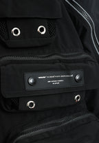 Abrigo puffer técnico con multibolsillos, cuello alto y forro térmico extraíble | MWM [PS_COLORS:BLACK]
