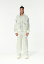 Chaqueta bomber vaquera con grandes bolsillos frontales y botones MWM en las mangas | MWM [PS_COLORS:ECRU-BLUE]