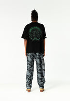 Camiseta de corte regular con motivo Eye MWM bordado en pecho y espalda | MWM [PS_COLORS:BLACK]