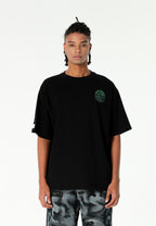 Camiseta de corte regular con motivo Eye MWM bordado en pecho y espalda | MWM [PS_COLORS:BLACK]