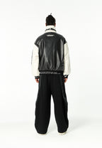 Chaqueta Iconic Logos efecto piel colorblock con cuello alto y cuatro bolsillos | MWM [PS_COLORS:BLACK]