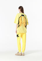 Pantalón jogger Wings con parches de estrellas y cadena lateral | MWM [PS_COLORS:YELLOW]