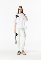 Camiseta Wings de corte relajado con estrellas frontales y doble parche de alas en la espalda | MWM [PS_COLORS:WHITE]