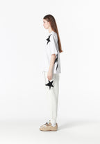 Camiseta Wings de corte relajado con estrellas frontales y doble parche de alas en la espalda | MWM [PS_COLORS:WHITE]