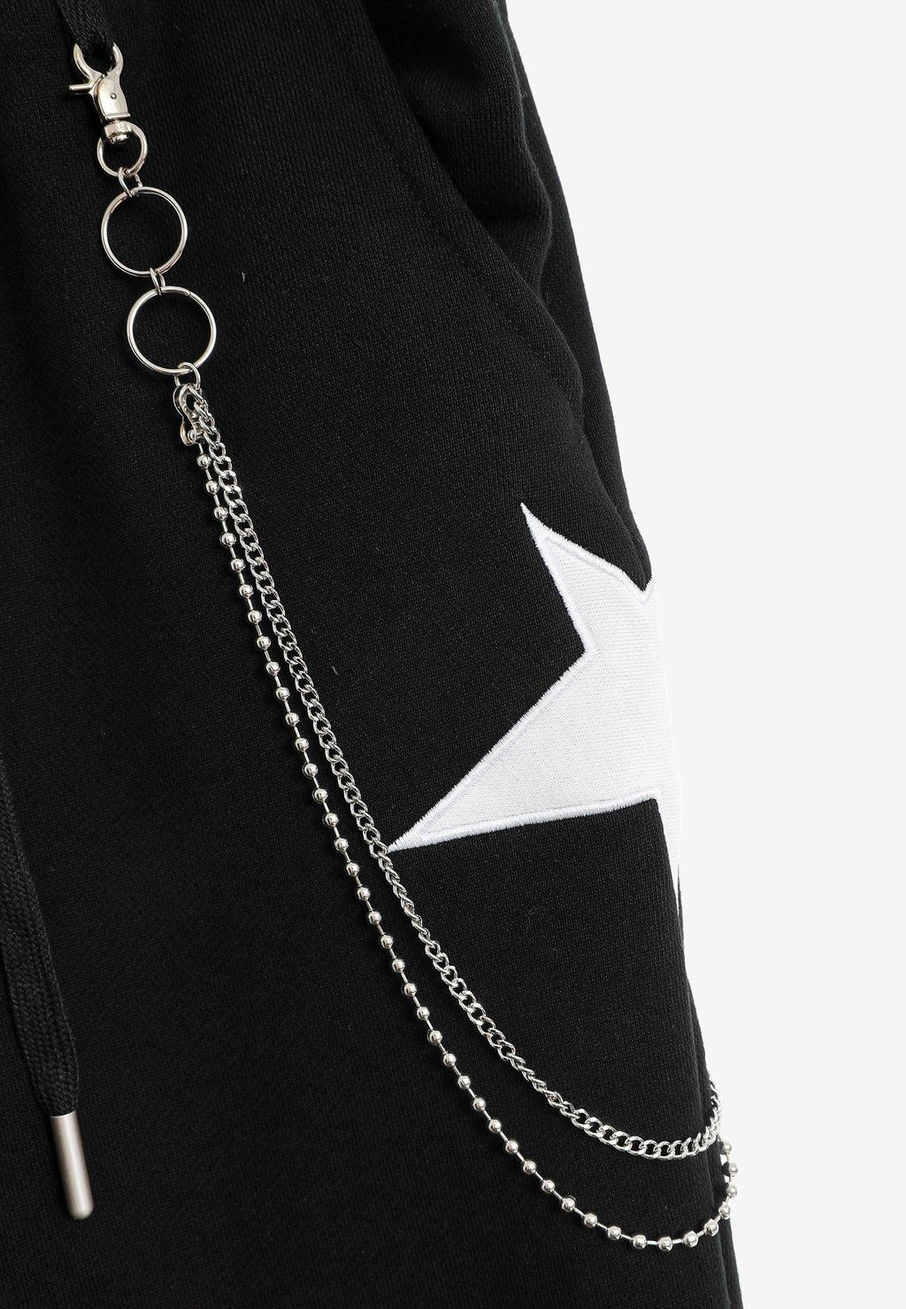 Pantalón jogger de niño Wings con parches de estrellas y cadena lateral | MWM [PS_COLORS:BLACK]