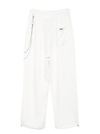 TROUSERS WITH CHAIN