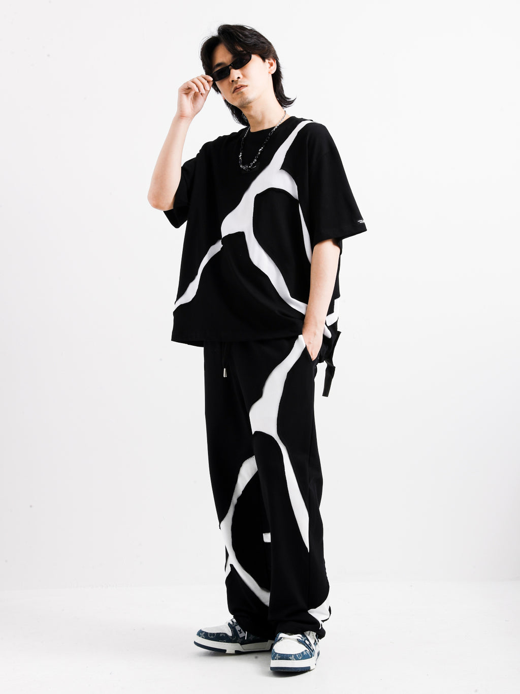 BLACK AND WHITE TROUSERS
